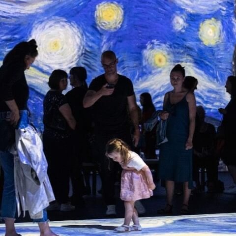 Image of girl and parents at Van Gogh Alive - Image by Rebecca McMillan Photography